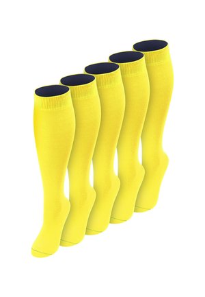 Fünf Paare leuchtend gelber knielanger Socken, in einer versetzten Reihe auf weißem Hintergrund angeordnet.