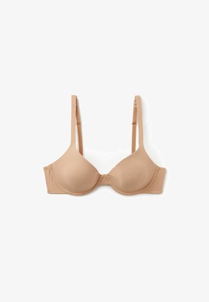 Soutien-gorge nude rembourré avec tissu lisse, soutien-gorge à armatures, bretelles réglables et conception de coque sans couture pour le confort et une forme naturelle.