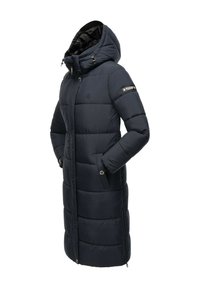 Navy blue long puffer coat with a hood, featuring stitched panels, a front zipper, side pockets, and a logo patch on the sleeve.