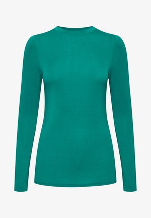 Tumesinine pikkade varrukatega särk ümmarguse kaelusega ja sileda, veniva tekstuuriga. Kujundus on lihtne, keha lähedalt istuv ilma lisamustrite või detailideta.