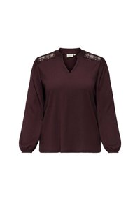 Top bordeaux à manches longues avec un décolleté en V, des accents en dentelle sur les épaules et des poignets ajustés. Tissu doux avec une coupe décontractée et une surface texturée.