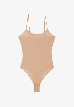 Maillot de bain une pièce couleur nude avec des bretelles ajustables, un design épuré et des ouvertures de jambe haute. Fabriqué en tissu lisse et extensible.