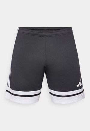 Črne športne hlače iz gladkega materiala. Značilne bele črte na robu in ob straneh. Elastičen pas za udobje. Logotip na spodnjem delu.