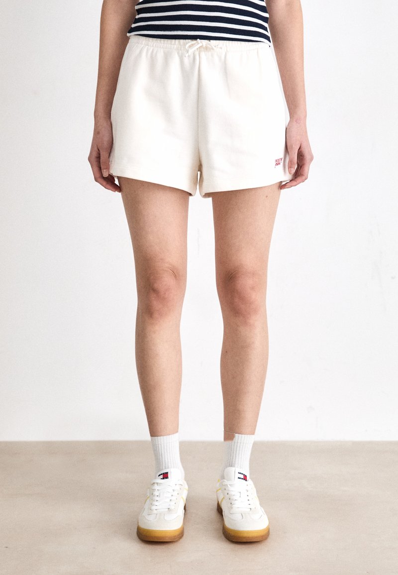 Tommy Jeans SCRIPT  - Tracksuit bottoms - ancient white