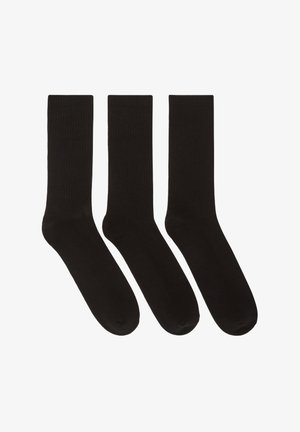 Czarne skarpetki bawełniane, trzy pary, długość do kostki, żebrowana struktura, gładkie wykończenie, zaokrąglony palec. Odpowiednie do codziennego noszenia.