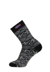 Wollsocken mit einem schwarz-weißen geometrischen Muster. Die Manschette hat ein kleines Detail mit der isländischen Flagge. Weiche Textur, warmes und strapazierfähiges Design.