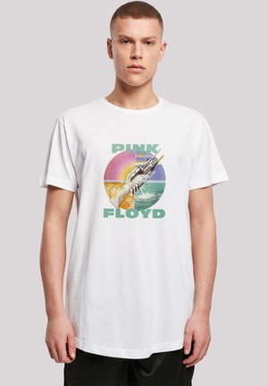 White cotton t-shirt featuring a graphic print with a multicolored circle, text "PINK FLOYD," and a stylized image of a futuristic spacecraft.