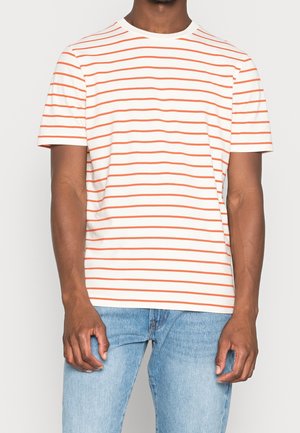 Koszulka z krótkim rękawem z białej bawełny z poziomymi pomarańczowymi paskami. Okrągły dekolt i luźny krój, o gładkiej fakturze.