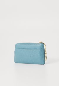 Blue leather wallet with a textured finish, featuring a gold zipper and chain. Includes a front pocket for added storage. Compact rectangular shape.