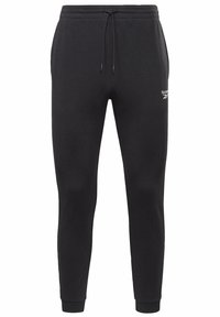 Black sweatpants featuring a drawstring waist, ribbed cuffs, and a small white logo on the left thigh. Made from a soft, cotton blend material.