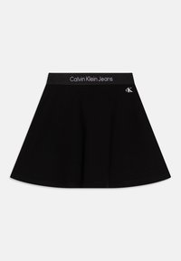 Jupe évasée noire en coton, dotée d'une large ceinture élastique avec le logo « Calvin Klein Jeans » et un petit emblème CK.