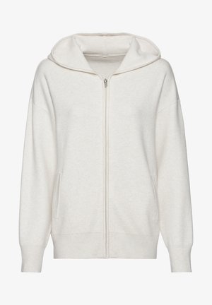 Kapuzensweatshirt mit Reißverschluss in hellem Beige, aus weichem Strickmaterial gefertigt. Es verfügt über einen Reißverschluss vorne, seitliche Taschen und gerippte Bündchen sowie Säume.