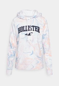 Bluza z kapturem w białym kolorze z pastelowym marmurkowym wzorem. Posiada przednią kieszeń, kaptur ze ściągaczem oraz napis "HOLLISTER" w kolorze granatowym. Miękki materiał.