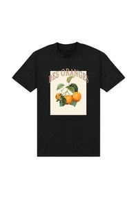 Černé bavlněné tričko s ilustrovaným designem pomerančů se zelenými listy a textem "DES ORANGES" v tučných, zakřivených písmenech.