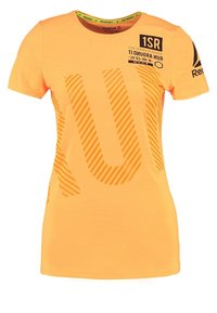 Orange short-sleeve T-shirt featuring tonal striped pattern and a printed label on the chest. Made from lightweight, breathable material.