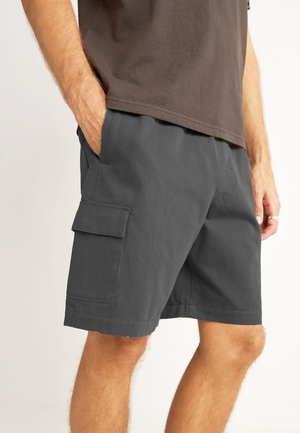 Dark gray cargo shorts made of lightweight fabric, featuring side pockets, a straight cut, and a clean hem finish.