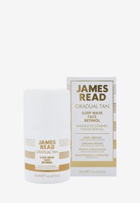 Contenitore cilindrico bianco con accenti dorati, etichettato "JAMES READ GRADUAL TAN SLEEP MASK FACE RETINOL." Accompagnato da una scatola coordinata.