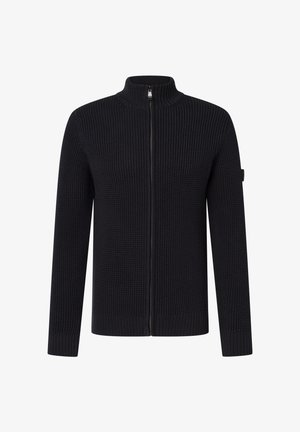 Cardigan lungo con zip e maniche lunghe in maglia nera, con colletto alto e motivo testurizzato, esposto su uno sfondo bianco.