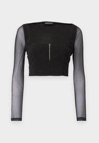 Svart crop top med firkantet utringning, laget av ugjennomsiktig stoff med gjennomsiktige lange ermer. Frontglidelås gir en ekstra detalj til designet.