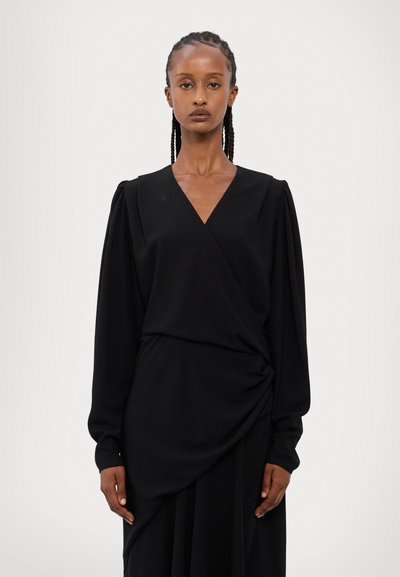Black wrap dress with long puff sleeves, deep V-neckline, side draping detail, made of soft fabric with a smooth texture.