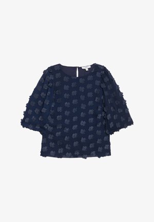 Blusa blu navy con maniche corte a campana, caratterizzata da un motivo floreale testurizzato sulla superficie. Dettaglio a chiave sul retro con chiusura a bottone.