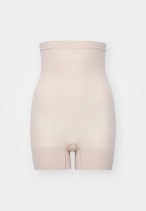 Beige shapewear shorts with a smooth texture, high waist, and mid-thigh length, featuring a seamless design and a subtle color gradient.