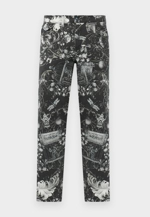Black jeans featuring intricate floral and ornamental patterns in gray. Five-pocket design with a zipper and button closure.