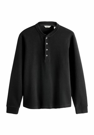 Czarna koszula z długim rękawem, z dekoltem henley i pięcioma guzikami, wykonana z textured materiału z prążkowanymi mankietami i dołem.