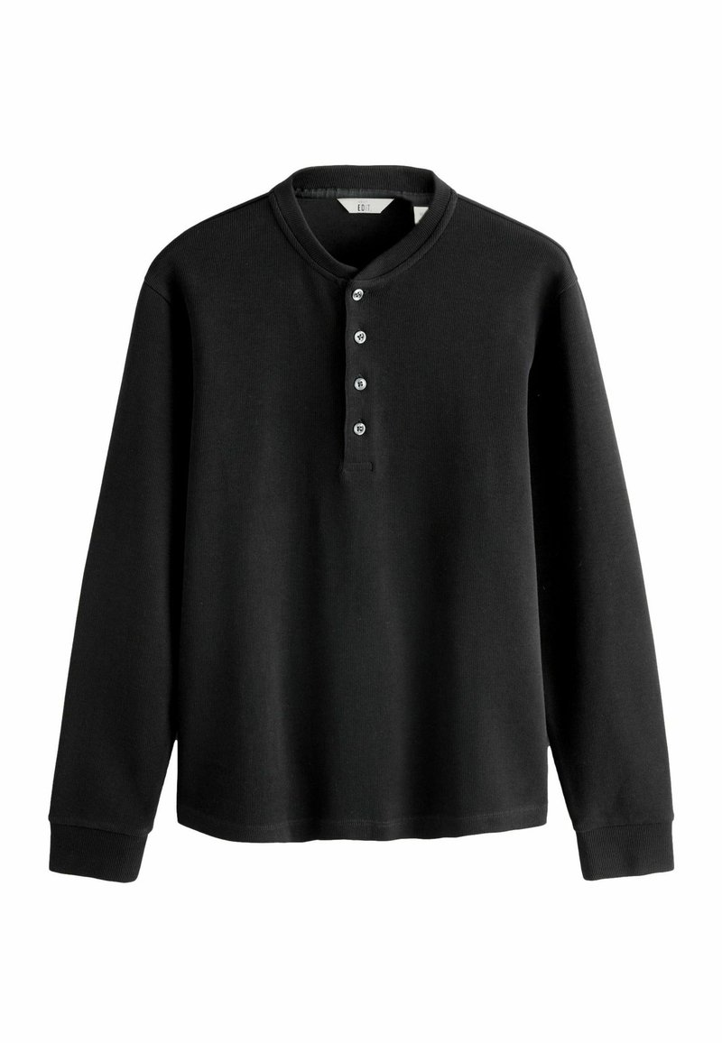 Schwarzes Langarmshirt mit Henley-Ausschnitt und fünf Knöpfen, aus strukturiertem Stoff mit gerippten Bündchen und Saum.