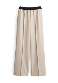 Beige, wijde broek met een zwarte elastische tailleband. Gemaakt van een gladde stof met een vloeiende val en scherpe plooien aan de voorkant.