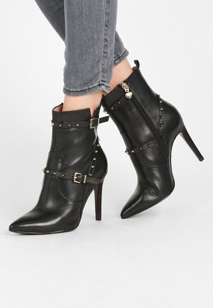 Bottines à talons hauts - black