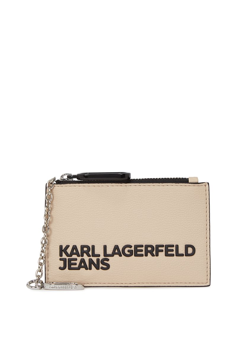 Beige leather cardholder with black embossed text "KARL LAGERFELD JEANS," featuring a zipper, chain, and a smooth texture.