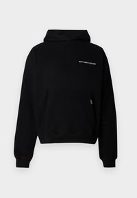 Zwarte hoodie met een frontzak, voorzien van witte tekst die "DON'T WASTE CULTURE" op de borst zegt. Zacht, textuurstof.