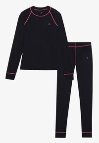 Black long-sleeve top and matching leggings with pink seam details and small reflective logo on chest and thigh, laid flat on white background.