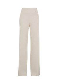 Pantalon large beige en matériau doux et extensible. Caractéristiques d'une taille haute et d'une texture lisse, offrant une coupe décontractée tout au long.
