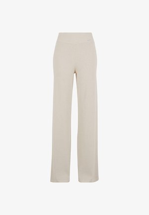 Pantalon large beige en matériau doux et extensible. Caractéristiques d'une taille haute et d'une texture lisse, offrant une coupe décontractée tout au long.