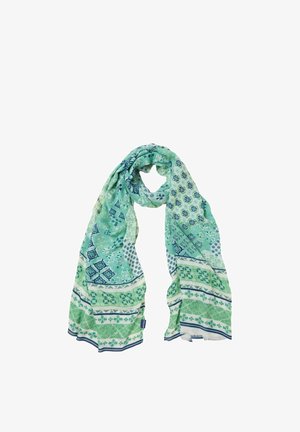 Heleroheline ja sinine mustriga sall lilleliste ja geomeetriliste kujunditega, lõdvalt ühendatud valgel taustal.