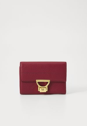 Red leather rectangular wallet with a textured finish, featuring a gold metal clasp and matching hardware accents.