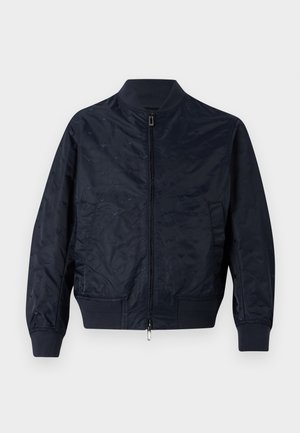 Navy blue bomber jacket made of shiny fabric, featuring a zip closure, ribbed cuffs and hem, and a subtle logo pattern throughout.