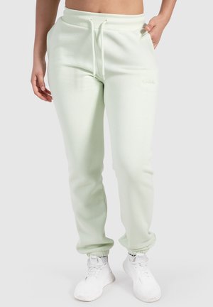 CASUAL SPORT DALILA - Tracksuit bottoms - hellgrün