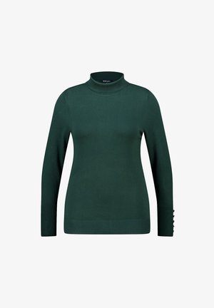 Donkergroene coltrui gemaakt van zacht gebreid materiaal. Heeft lange mouwen met knoopaccenten bij de manchetten en een getailleerd silhouet.