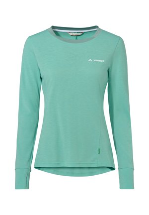 Turquoise sportief shirt met lange mouwen, duimgaten en een klein wit Vaude-logo op de linkerborst.
