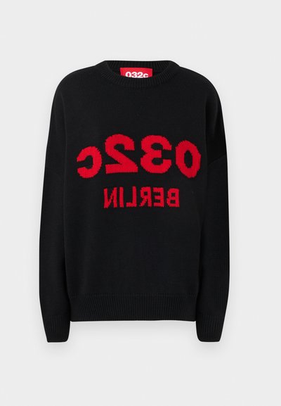 Black knit sweater featuring red graphic text "0326 BERLIN" on the front. Round neckline and ribbed cuffs. Soft texture and casual fit.