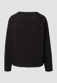 Zwarte top met lange mouwen, ronde halslijn, raglanmouwen en een licht gebogen zoom. Soepele textuur en een ingetogen ontwerp.