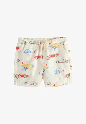 Børneshorts i cremefarve med røde racerbiler, blå helikoptere og gule fly trykt, med elastik i taljen og en snor til at stramme.