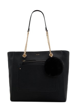 Czarna teksturowana torba typu tote z uchwytami z łańcuszka w kolorze złota, przednią kieszenią, wewnętrzną saszetką na zamek oraz okrągłym czarnym pomponem z futra zawieszonym z boku.