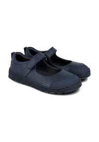 Par de zapatos estilo Mary Jane en azul marino con correas de velcro y suelas de goma negra, diseñados para uso casual o escolar.