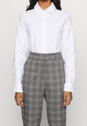 Blusa - white