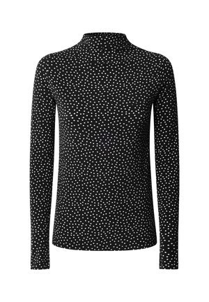 Black long-sleeve turtleneck shirt with white irregular polka dots, fitted cut, displayed on a plain white background.