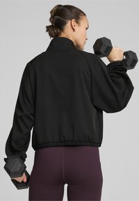 Puma HYPERNATURAL  1/2 ZIP - Outdoorjacka - black